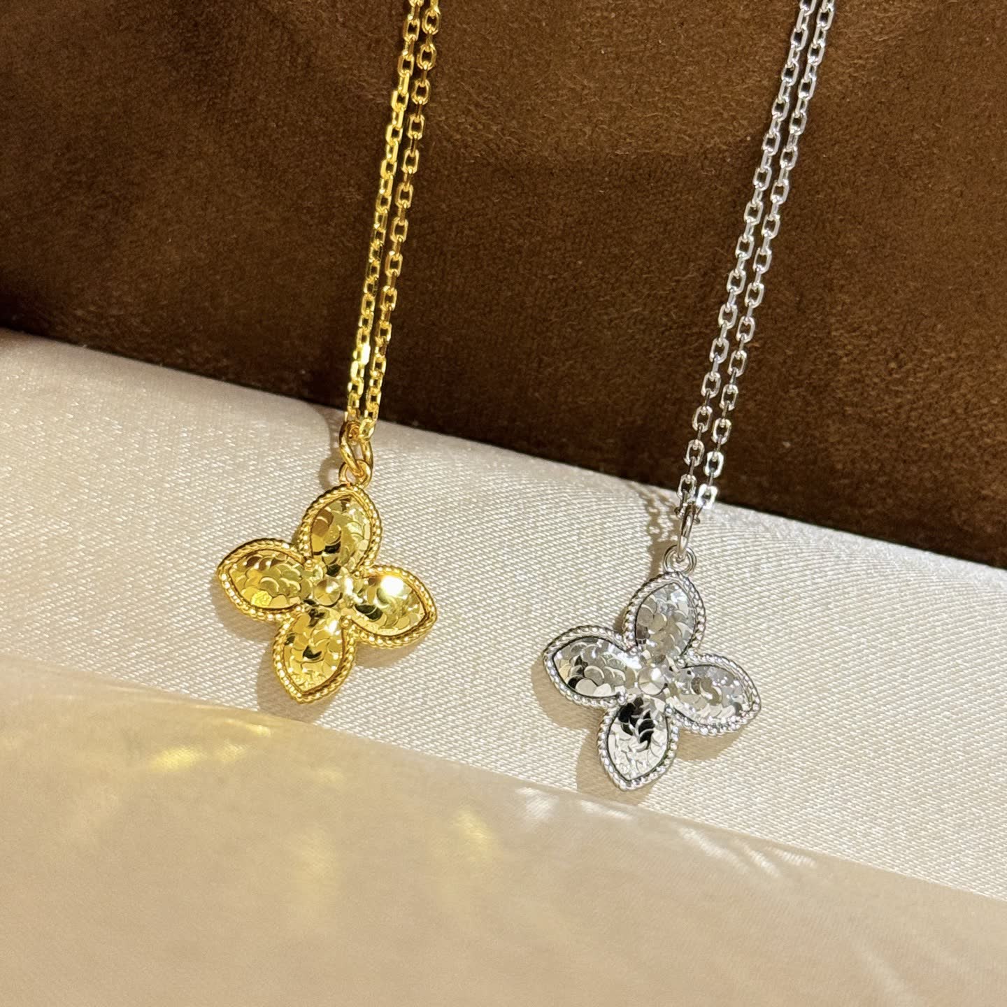 Van Cleef & Arpels Gold and Silver Flower Pendant Necklaces